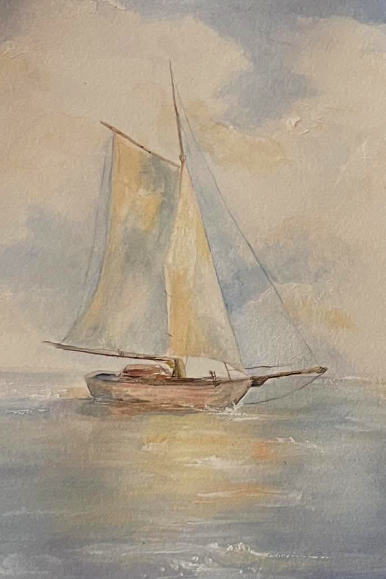 Sailboat on the ocean with sunny reflections